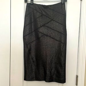New Dark gray skirt. Size 2. Part of a 2 piece. 87% Polyester 3% Spandex
